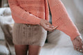 Woman wearing a handmade knitted sweater